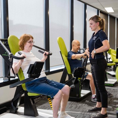 UQ Master of Clinical Exercise Physiology student practitioner Kristin Murray works with Emeritus Professor Tian Po Oei and his wife Elizabeth at UQ Healthy Living.